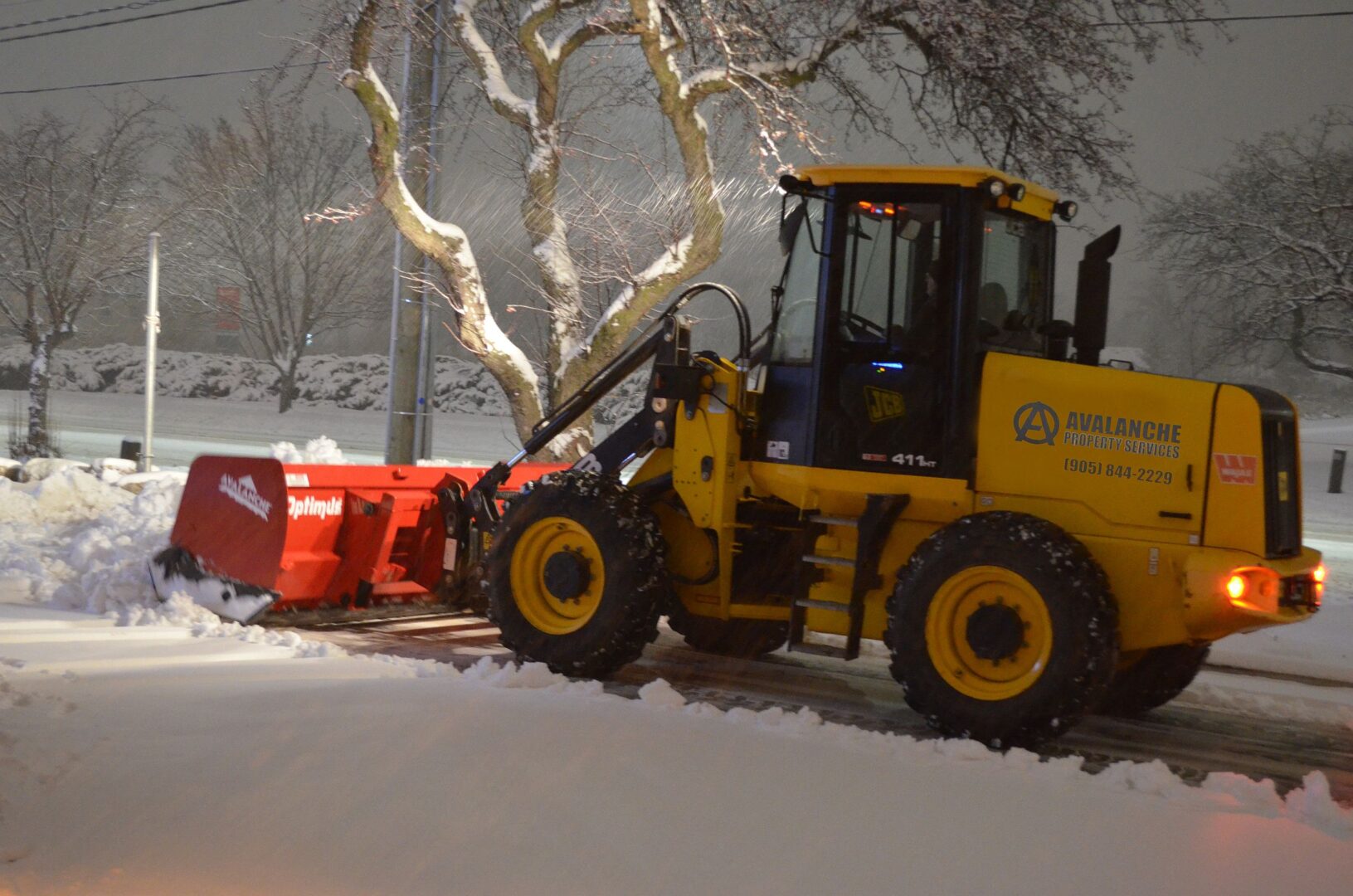 Snow plowing with one of our loaders